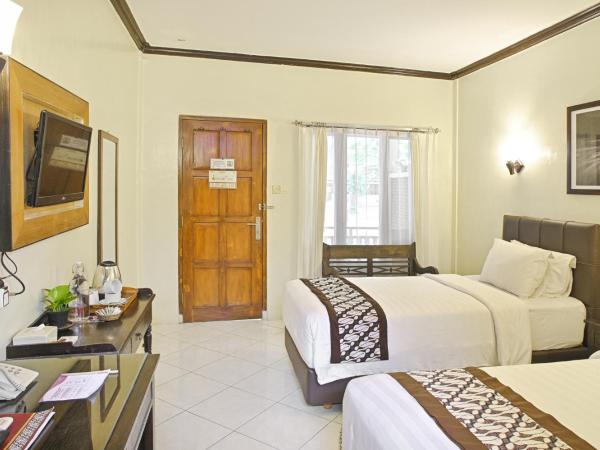 Paku Mas Hotel : photo 2 de la chambre chambre lits jumeaux supérieure
