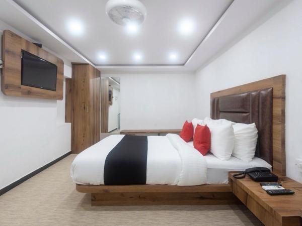 Hotel O Babas Residency : photo 10 de la chambre chambre triple classique