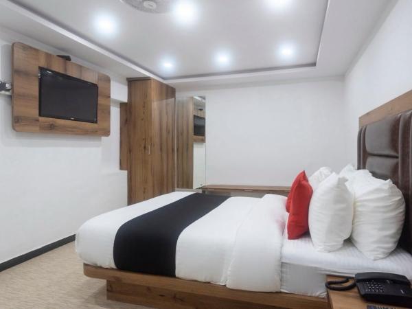 Hotel O Babas Residency : photo 1 de la chambre chambre triple classique