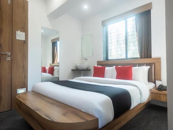 Hotel O Babas Residency : photo 3 de la chambre chambre triple classique