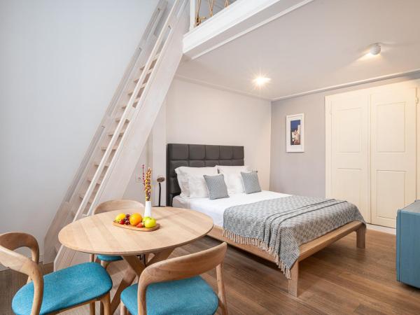 Clouds Boutique Guesthouse : photo 1 de la chambre chambre deluxe avec 2 lits queen-size