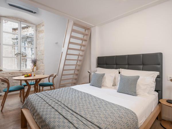 Clouds Boutique Guesthouse : photo 2 de la chambre chambre deluxe avec 2 lits queen-size