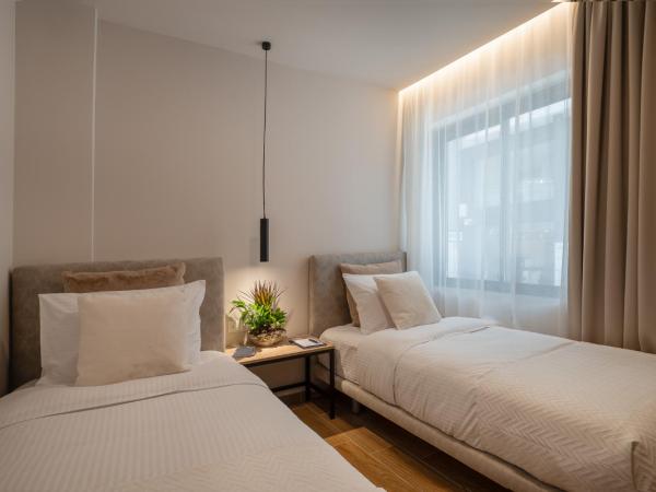 IRA - ΗΡΑ Hotel : photo 1 de la chambre chambre lits jumeaux pour personnes à mobilité réduite