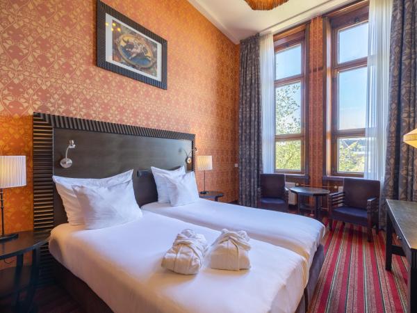Grand Hotel Amrâth Amsterdam : photo 1 de la chambre chambre double ou lits jumeaux - vue sur canal