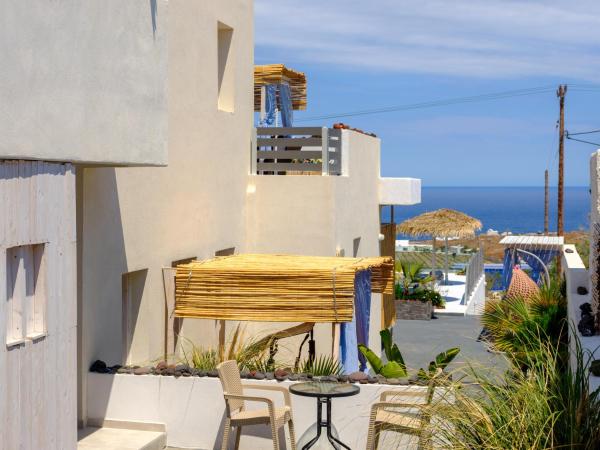 Nalu Suites : photo 4 de la chambre suite supérieure avec vue latérale sur la mer
