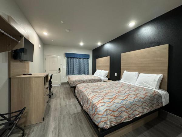 Crystal Inn Gessner- Near Sam Houston Racepark : photo 1 de la chambre chambre double avec salle de bains privative