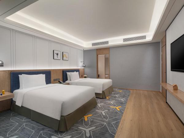 voco Guangzhou Shifu, an IHG Hotel : photo 5 de la chambre one-bedroom suite with living area