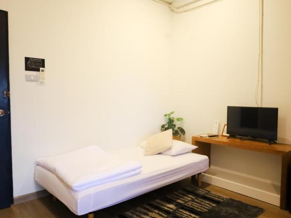 The51Hometel : photo 6 de la chambre suite familiale