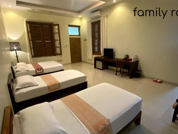 Puri Pangeran Hotel : photo 1 de la chambre chambre familiale avec terrasse 