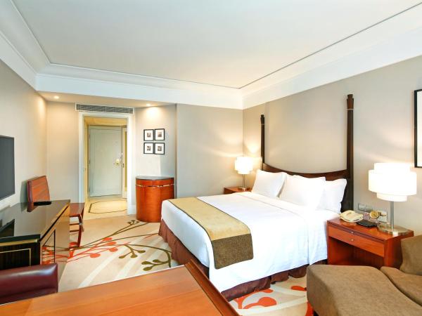 Jin Jiang Hotel : photo 2 de la chambre grande chambre deluxe lit king-size - cathay garden