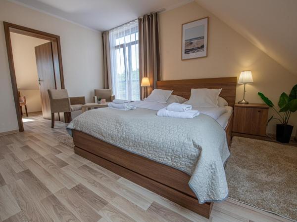 Rezydencja Familia : photo 3 de la chambre chambre familiale