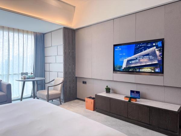 Beijing Xiamenair Jianianhua Hotel : photo 2 de la chambre chambre affaires lit queen-size