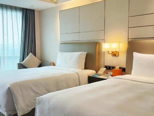 Beijing Xiamenair Jianianhua Hotel : photo 1 de la chambre chambre lits jumeaux avec vue