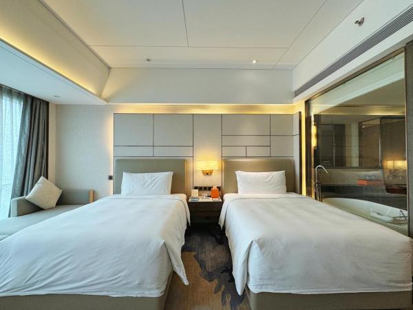 Beijing Xiamenair Jianianhua Hotel : photo 4 de la chambre chambre lits jumeaux avec vue