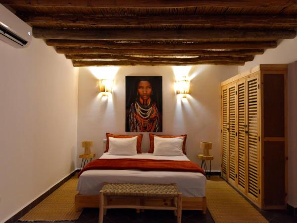 Villa Agora, Villa à la campagne proche Marrakech : photo 1 de la chambre chambre quadruple - vue sur jardin