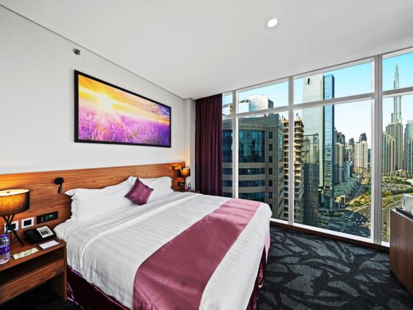 Park Regis Business Bay : photo 9 de la chambre chambre de luxe - vue sur burj khalifa 