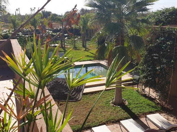 Maison d'Hôtes à Marrakech : photo 1 de la chambre chambre lit king-size - vue sur jardin