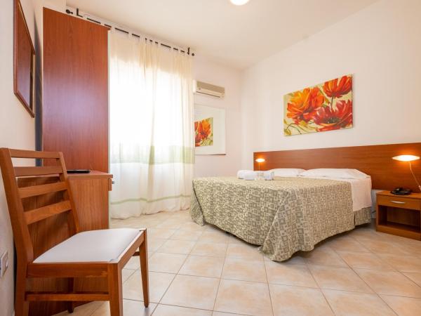 Hotel Il Gabbiano : photo 5 de la chambre chambre quadruple