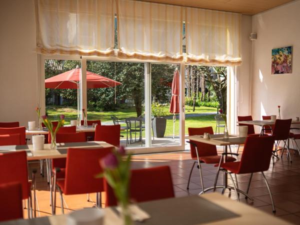 Parkhotel Emmaus - Casa del Sole : photo 6 de la chambre double room with balcony and garden view