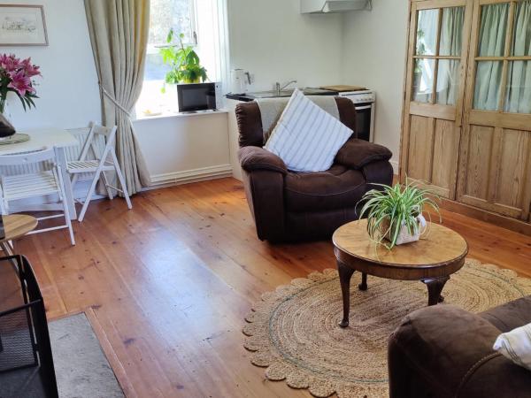 Carney House : photo 2 de la chambre chambre lit queen-size - vue sur jardin