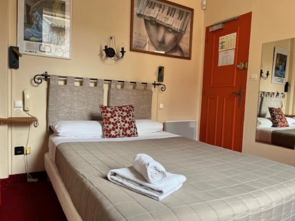 Hôtel Le Colbert : photo 4 de la chambre chambre simple