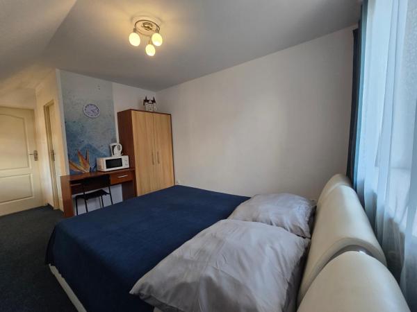 Dom gościnny PRZYTULNOŚĆ : photo 5 de la chambre chambre double avec salle de bains privative