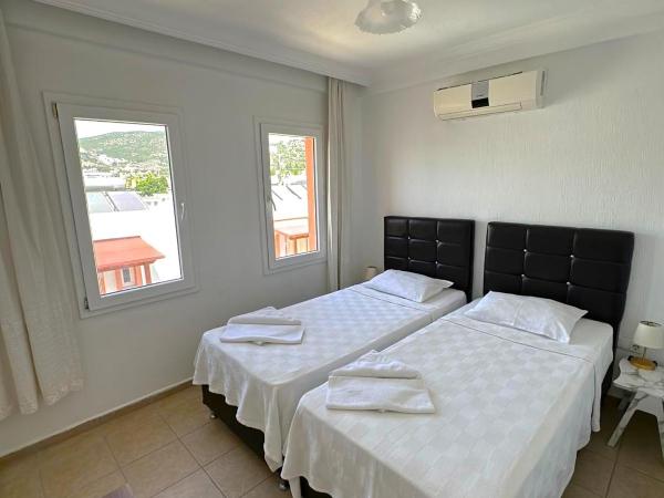 Pinky Apart Otel Bodrum : photo 5 de la chambre chambre lits jumeaux standard