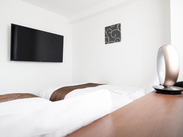 Toyo Hotel : photo 2 de la chambre chambre lits jumeaux de luxe - non-fumeurs