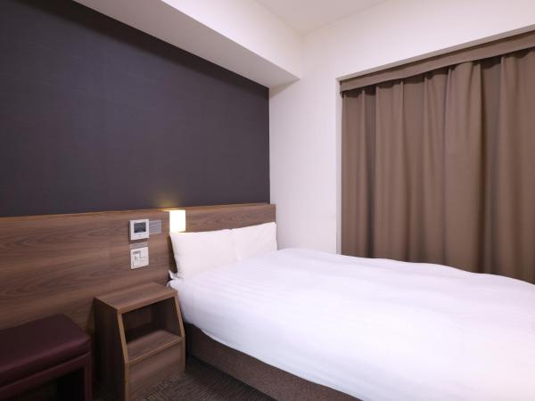Dormy Inn Premium Nagoya Sakae : photo 1 de la chambre chambre double avec petit lit double - non-fumeurs