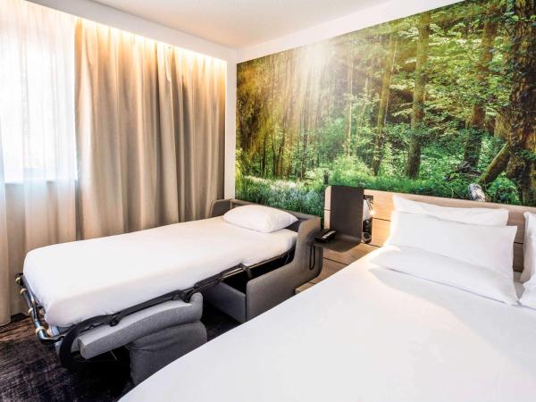 Novotel Rennes Alma : photo 2 de la chambre chambre lit queen-size supérieure avec canapé