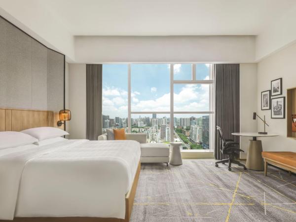 Sheraton Guangzhou Hotel : photo 1 de la chambre chambre lit king-size deluxe - vue sur ville