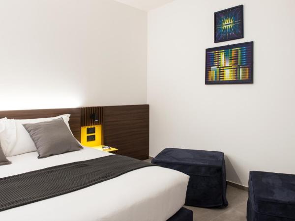 Spazio Gagarin Residence : photo 4 de la chambre matrimonial/quadruple