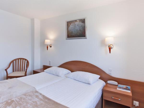 Le Neptune & Spa : photo 2 de la chambre chambre lits jumeaux