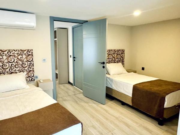 Toprak City Hotel Antalya : photo 5 de la chambre chambre familiale - vue sur jardin