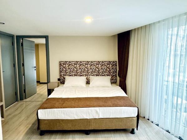 Toprak City Hotel Antalya : photo 1 de la chambre chambre familiale - vue sur jardin