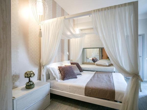 Hotel Villa Paola : photo 3 de la chambre chambre familiale