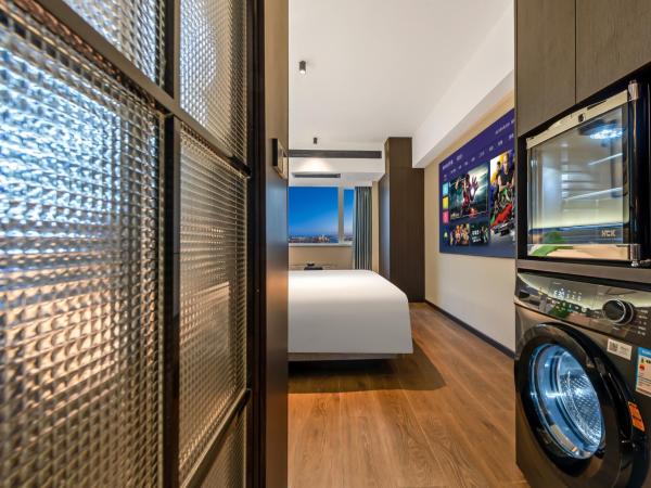 Xi'an Firefly Hotel : photo 10 de la chambre chambre lit queen-size 