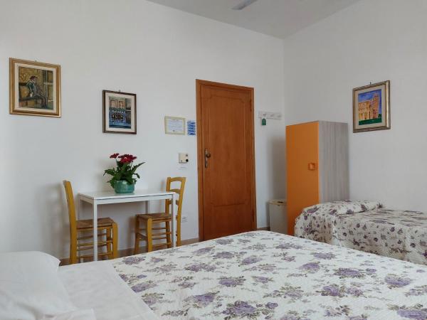 B&B SoleLuna : photo 3 de la chambre chambre triple avec salle de bains privative