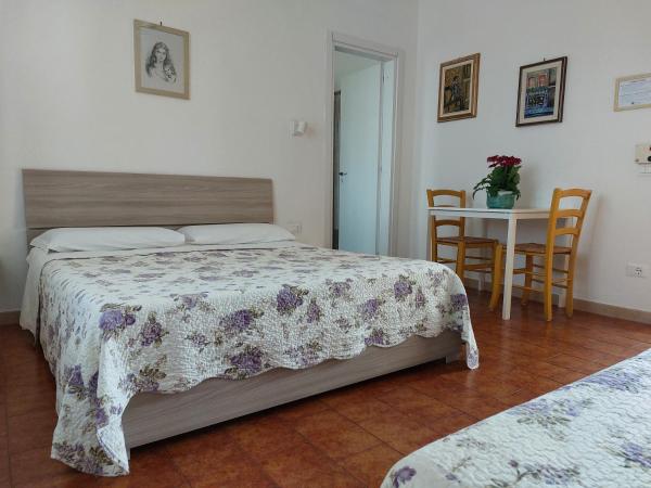 B&B SoleLuna : photo 2 de la chambre chambre triple avec salle de bains privative