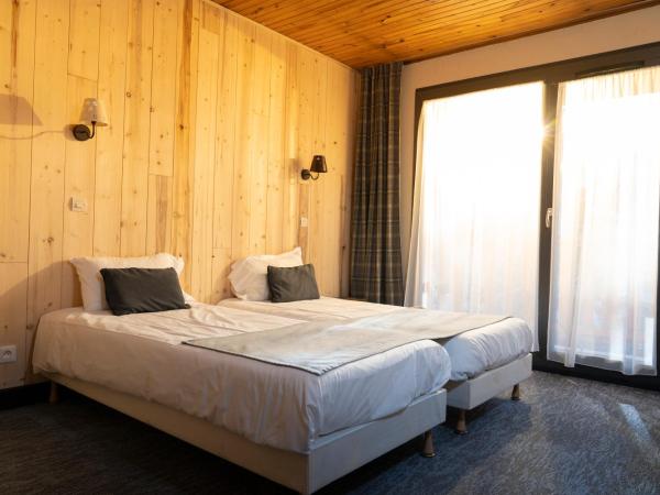 Chamois Lodge : photo 2 de la chambre chambre lits jumeaux
