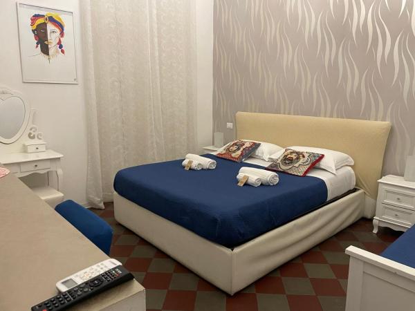 Sleep Inn Catania rooms - Affittacamere : photo 2 de la chambre chambre triple deluxe