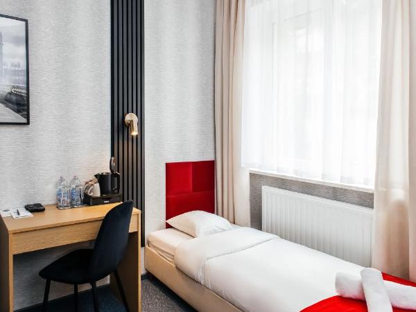 Elegant Apartments : photo 4 de la chambre chambre lits jumeaux avec salle de bains privative