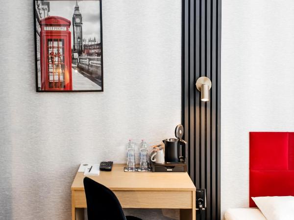 Elegant Apartments : photo 5 de la chambre chambre lits jumeaux avec salle de bains privative