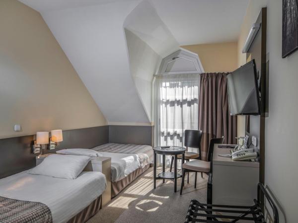 Corvin Hotel Budapest Corvin Wing : photo 2 de la chambre chambre standard avec 2 lits simples