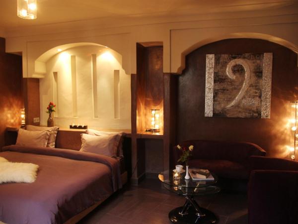Riad Carllian : photo 5 de la chambre suite lit king-size avec jacuzzi