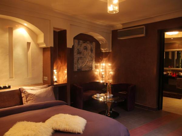 Riad Carllian : photo 6 de la chambre suite lit king-size avec jacuzzi