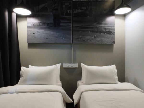 Rucksack Inn Premium Melaka : photo 7 de la chambre chambre lits jumeaux standard