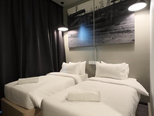 Rucksack Inn Premium Melaka : photo 6 de la chambre chambre lits jumeaux standard