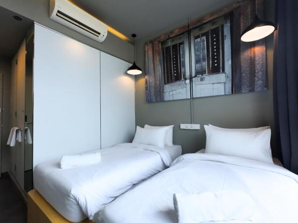 Rucksack Inn Premium Melaka : photo 4 de la chambre chambre lits jumeaux standard