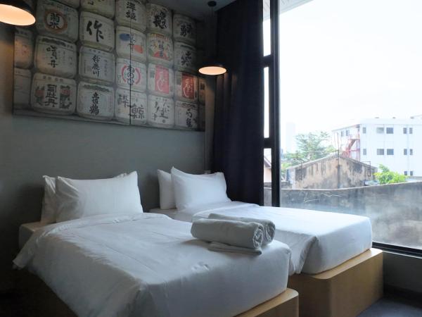 Rucksack Inn Premium Melaka : photo 3 de la chambre chambre lits jumeaux standard